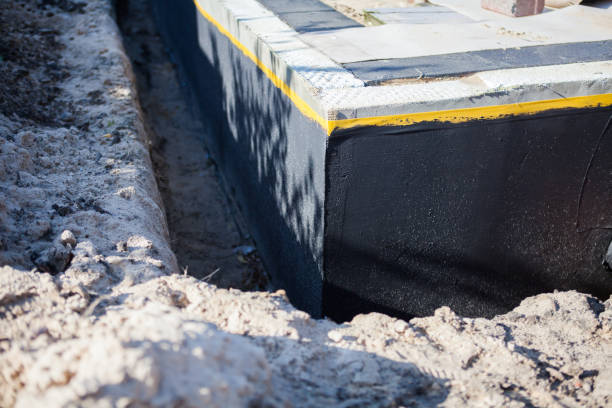 Professional Foundation Crack Repair technician working in Stockbridge, MI
